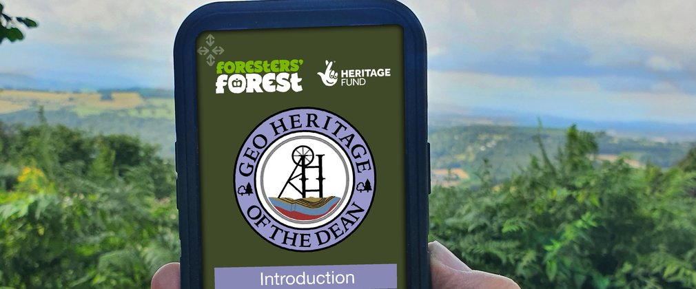 Mobile phone showing Geoheritage app on the screen