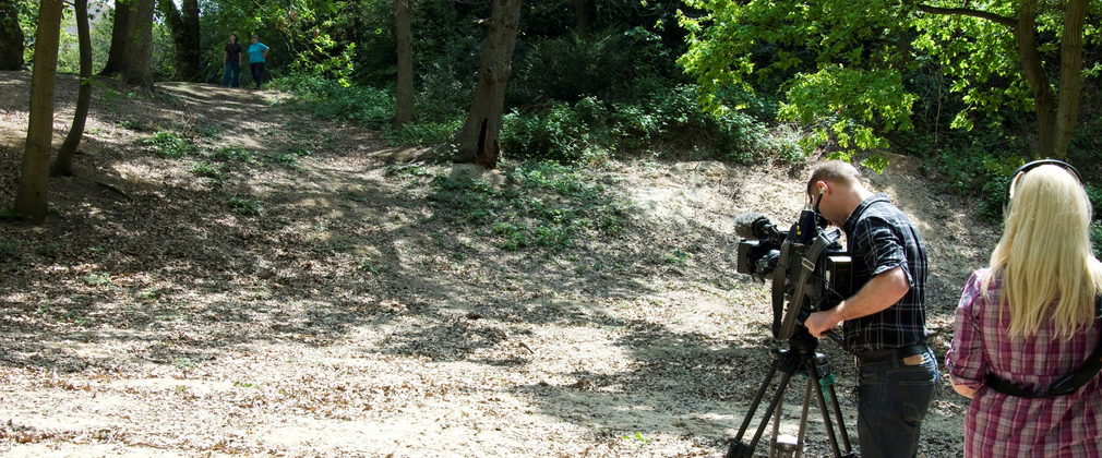Crew filming in the forest
