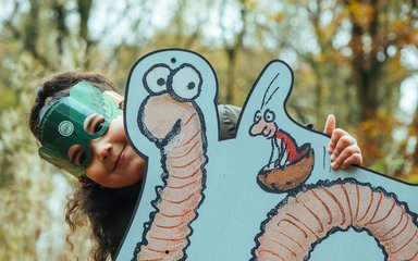 Girl in mask with Superworm 