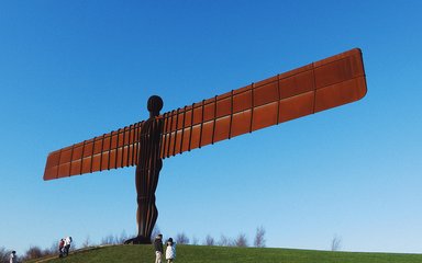 The Angel of the North sculpture with blue skies