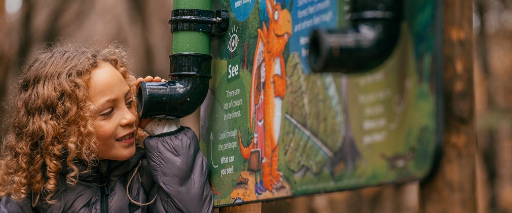 Girl listening to Zog activity trail