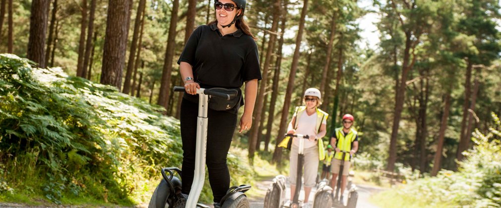 Woman on Segway in the forest