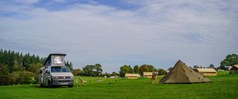 Bracelands campsite with bell tent safari tent and campervan