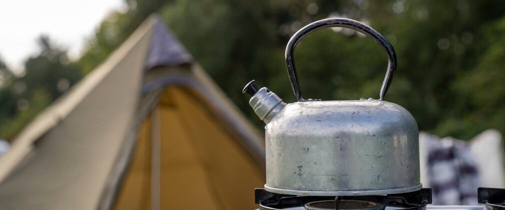 Bell tent with kettle at Bracelands campsite