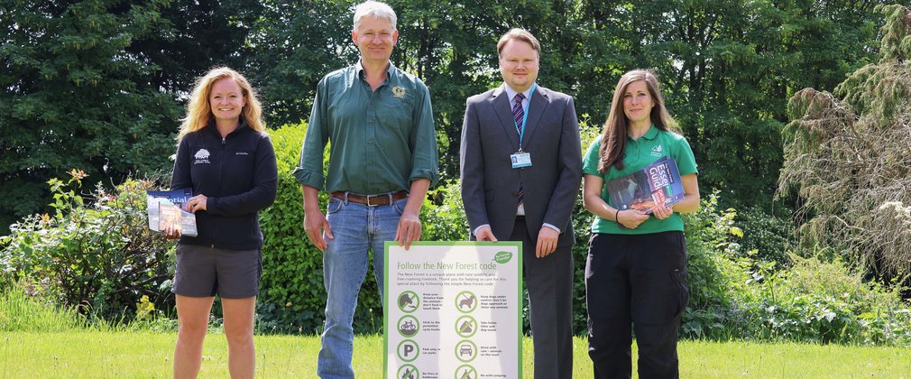 A group photograph of partner organisations supporting the New Forest Code