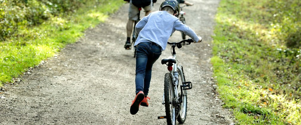 Family biking in Fineshade Woods