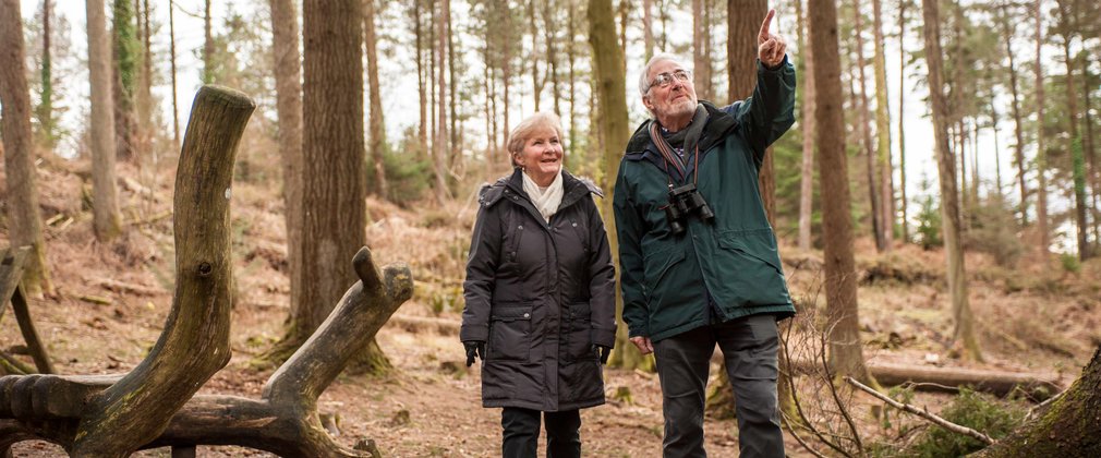 Older couple wildlife spotting