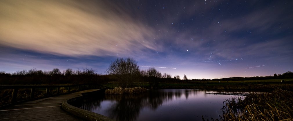 Jeskyns at dusk, with the light reflecting off Henhurst Lake.
