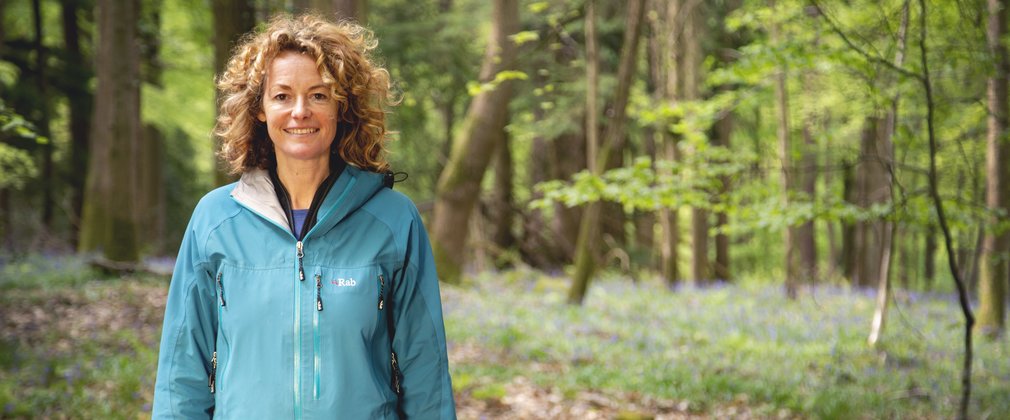 Kate Humble against a bluebell woodland backdrop