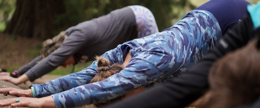 People stretching in pilates