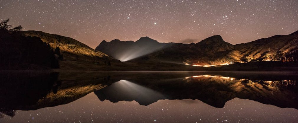 Stars and lights over Blea Tarn