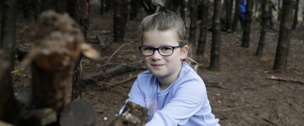 Girl in forest setting