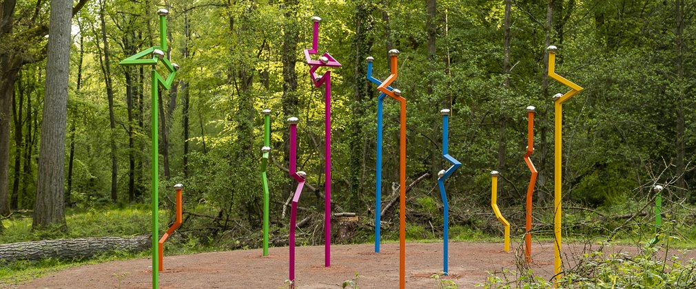 12 coloured, metal, vertical sculptures