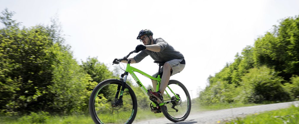 Man cycling at Hicks Lodge