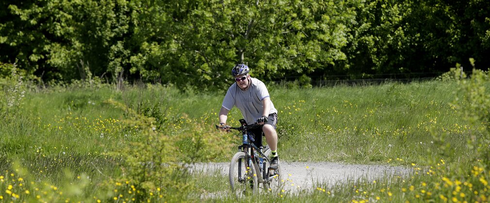 A person cycling at Hicks Lodge