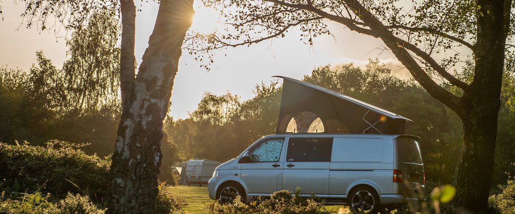 Campervan in forest
