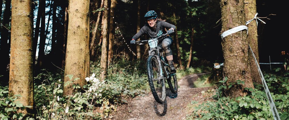 Female mountain biker taking part in a race