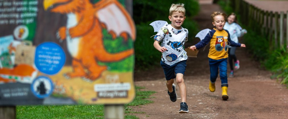 Kids running at Zog trail in forest