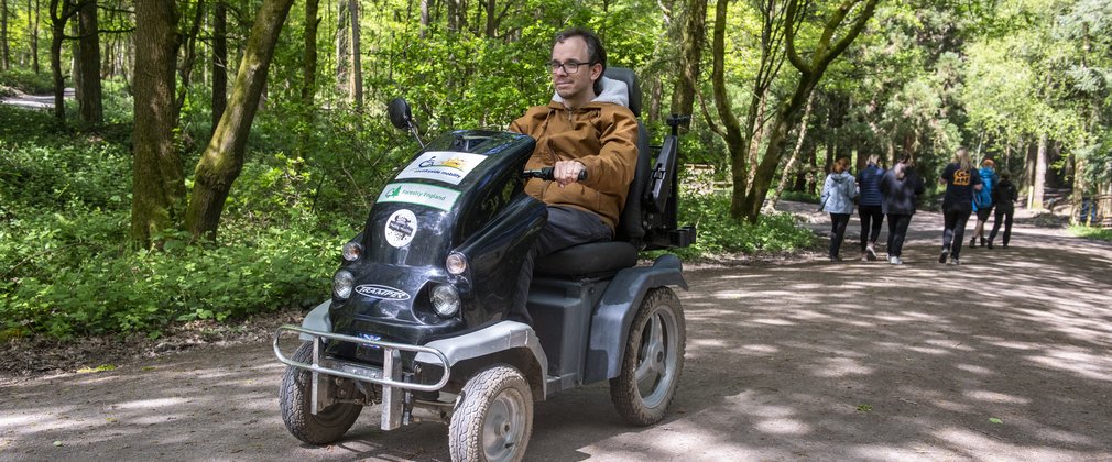 Man using an off-road mobility scooter