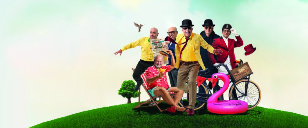The band Madness celebrate their new tour dates with summer themed memorabilia including deck chairs and an inflatable flamingo.