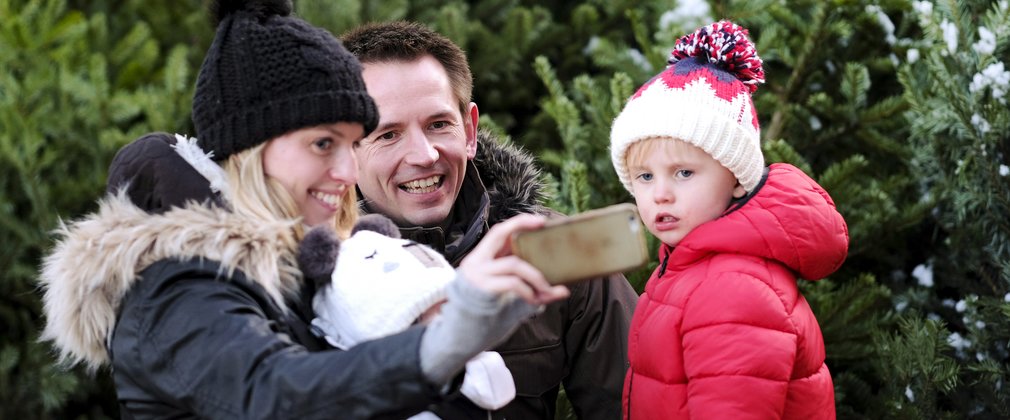 Family choosing Christmas Tree