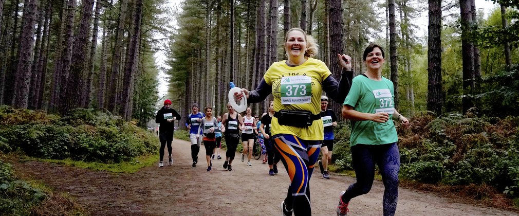 People running at Forest Runner event