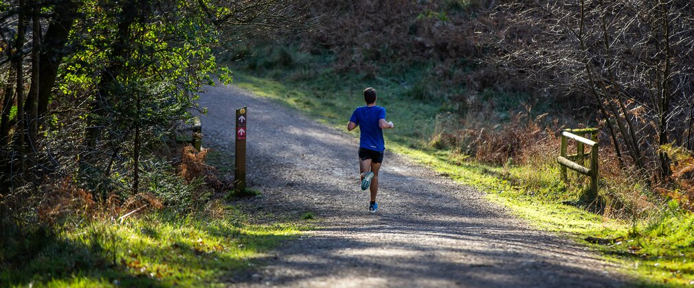 Man running in the forest
