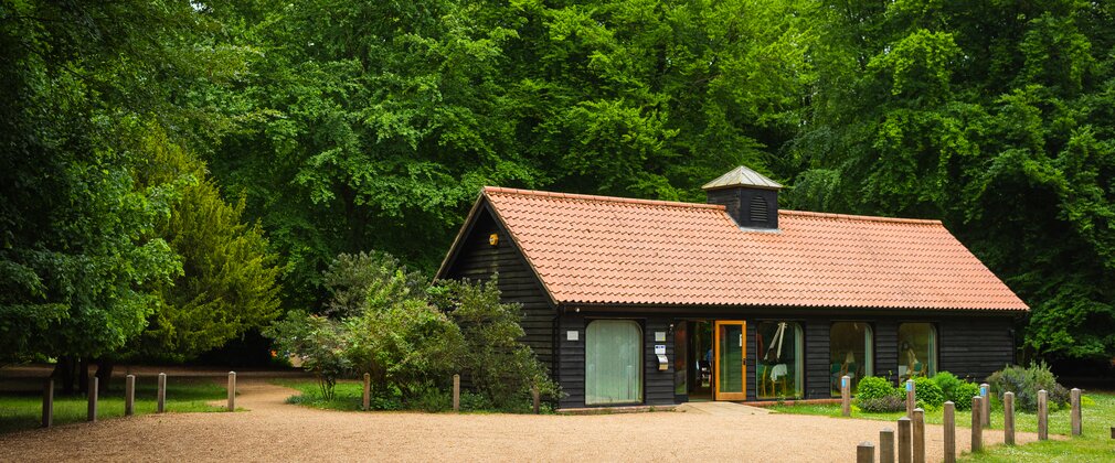 view of oak lodge event building set amongst trees