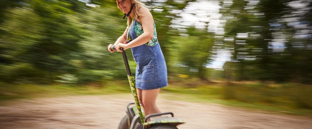 A person riding a segway