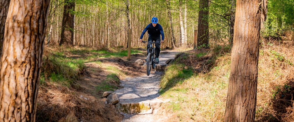 cyclist rides drops on lime burner at High Lodge