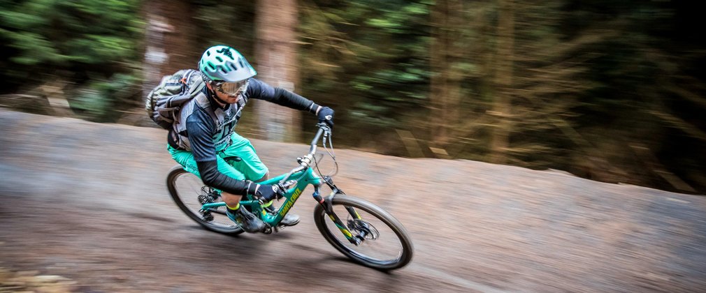 Mountain biker racing in Hamsterley Forest