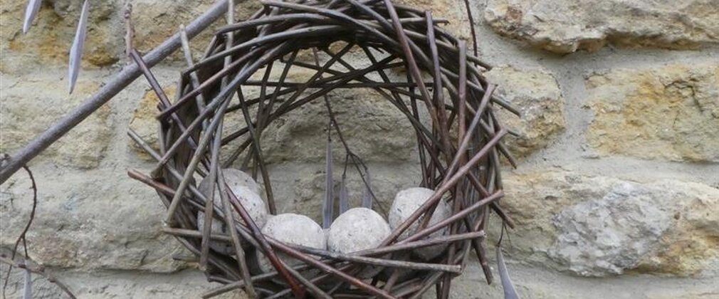 A willow woven bird feeder