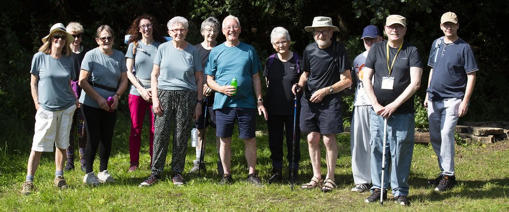 Group of people standing on grass