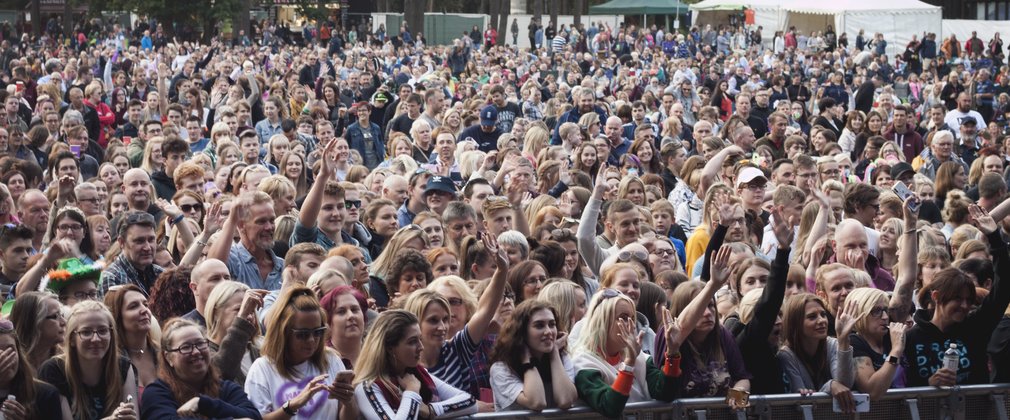 View of crowd from the stage of an outdoor concert