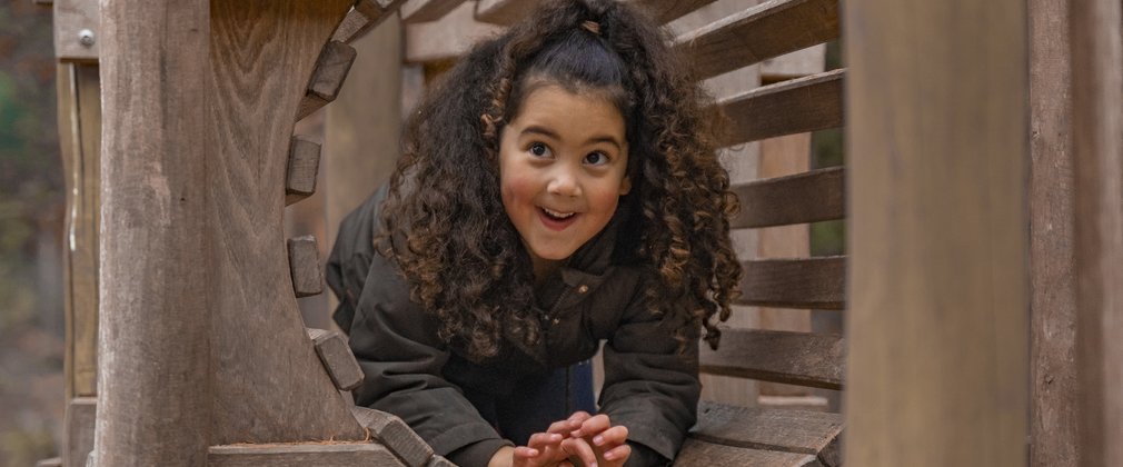 Child playing in a tunnel