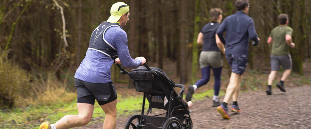 People running in forest 
