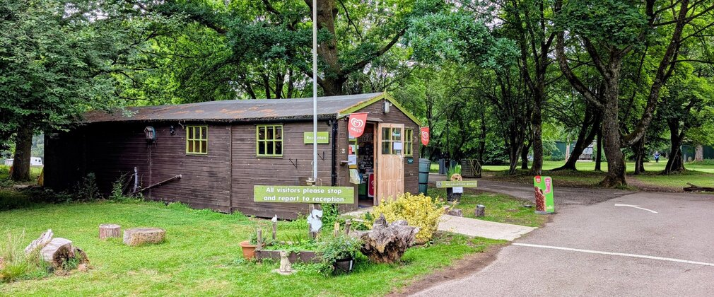 Exterior of wooden reception building at Postern Hill campsite