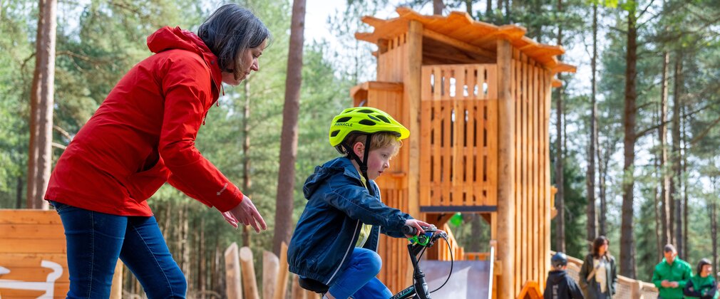 boy rides his bike at Pedal and Play