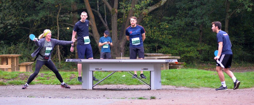 People playing table tennis at Salcey Forest