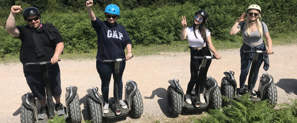 family enjoying a segway adventure in the forest 