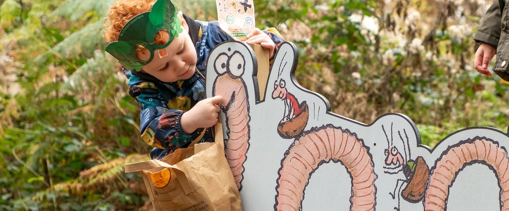 Child looking at Superworm