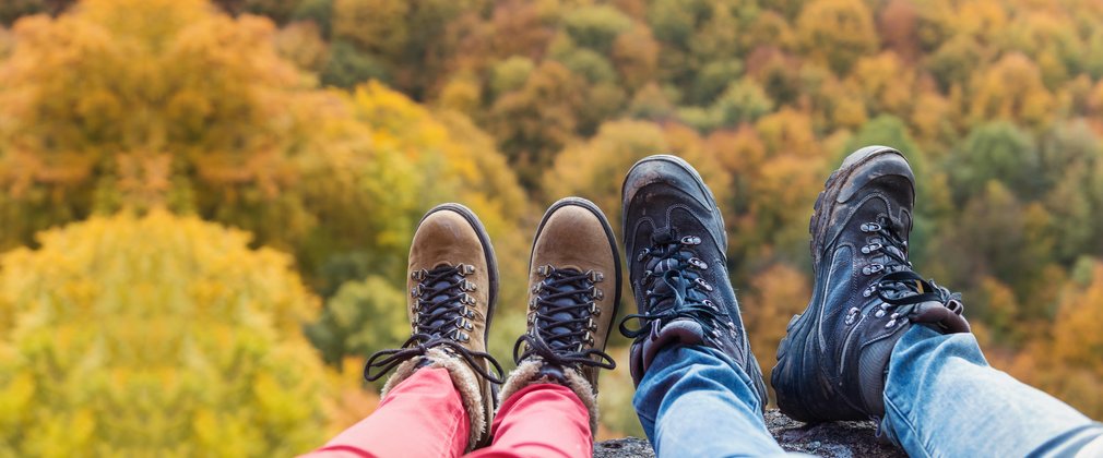 Feet against a colourful autumn backdrop