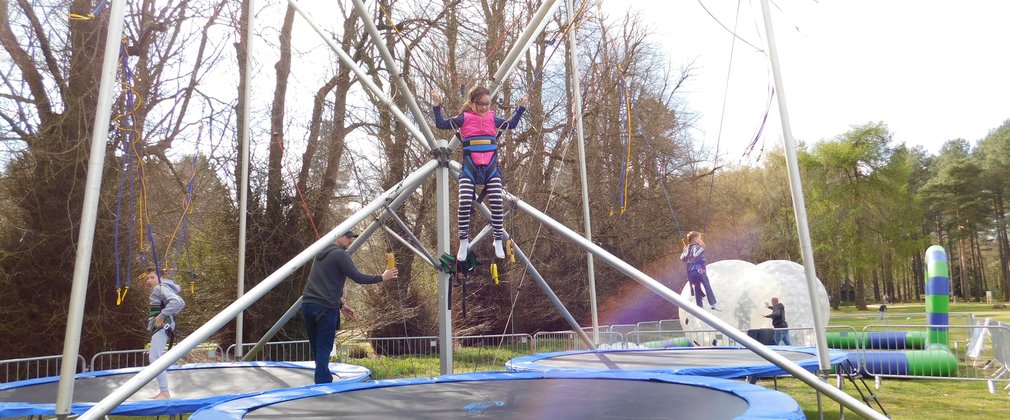 Child jumping on trampoline 
