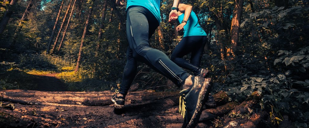 trail runner in forest