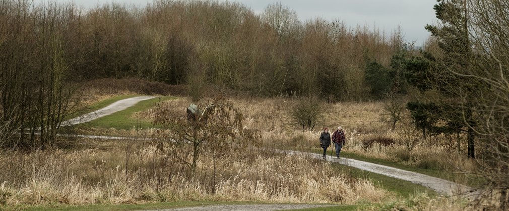 A couple walking at Viridor Woods in the north west