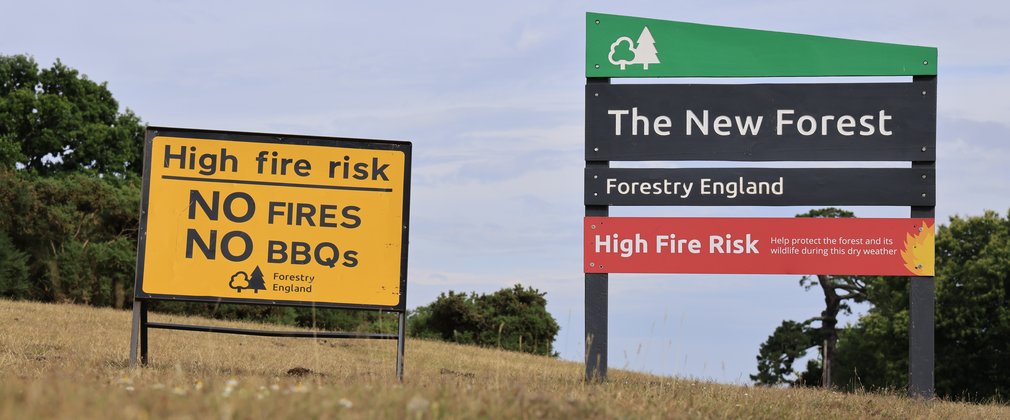 High fire risk signs in the New Forest saying no fires and no BBQs