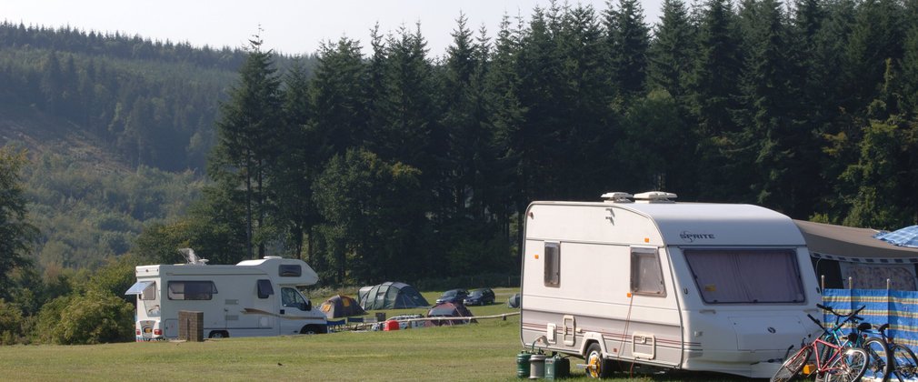 Caravan in field