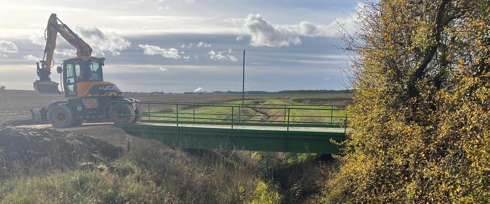 Machinery on bridge for repairs at Chambers Farm Wood