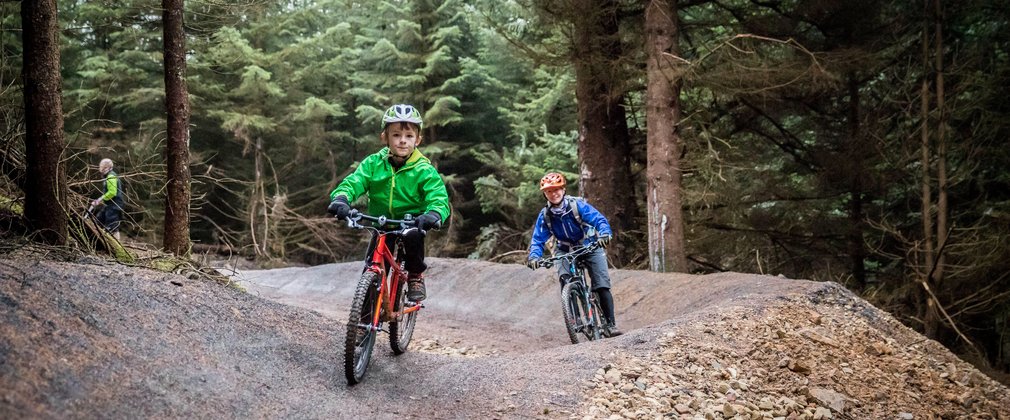 children cycling on family friendly trail