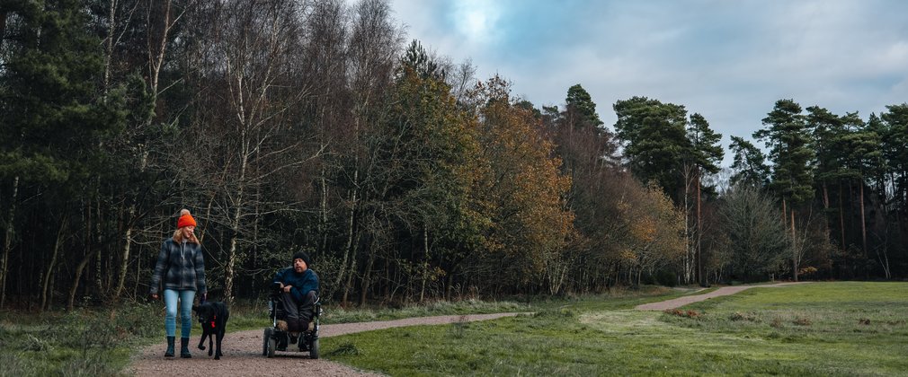 Accessible trail users with dog